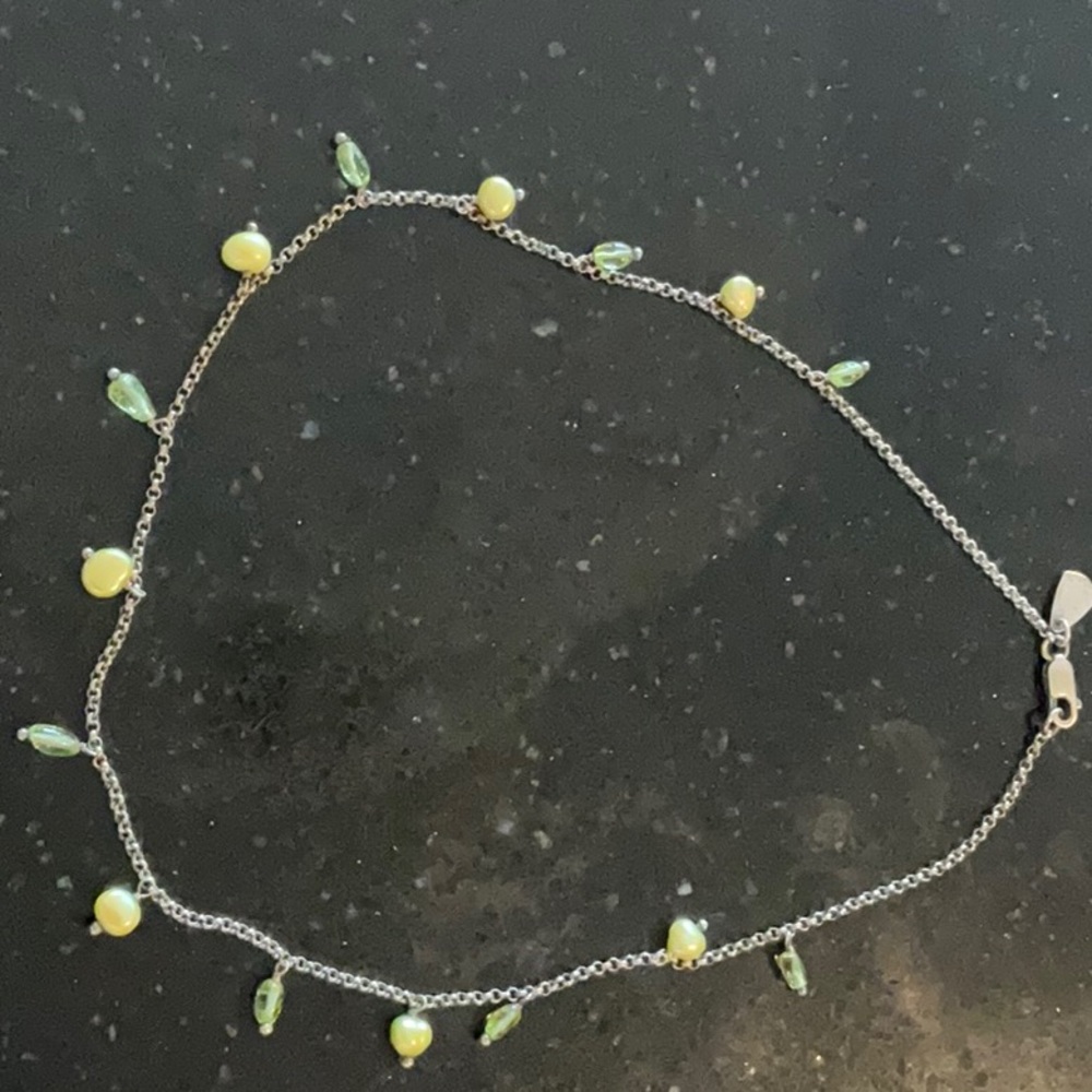 Silplada necklace, sterling silver with green pearlized and clear beads.